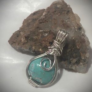 Turquoise in fine silver pendant